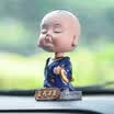 Molong new small monk car accessories car cute cartoon doll creative car ornaments financial resources billowing