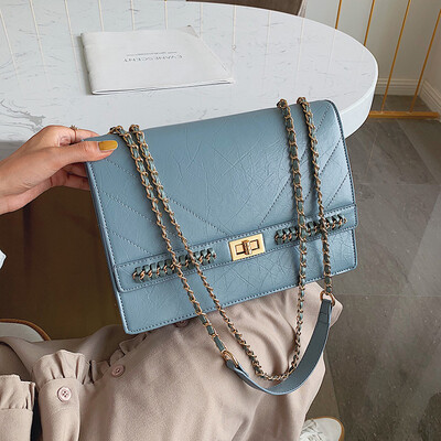 Qiao Bani 2019 new European&American style fashion street shooting solid color chain flip cover shoulder slant diagonal trend handbags
Qiao Bani 2019 new European&American style fashion street shooting solid color chain flip cover shoulder slant diagonal trend handbags