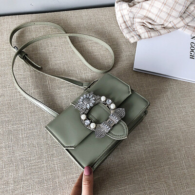 Qiao Bani 2019 new Korean fashion Dongdaemun solid color pearl small square bag wild shoulder diagonal PU handbag
Qiao Bani 2019 new Korean fashion Dongdaemun solid color pearl small square bag wild shoulder diagonal PU handbag
