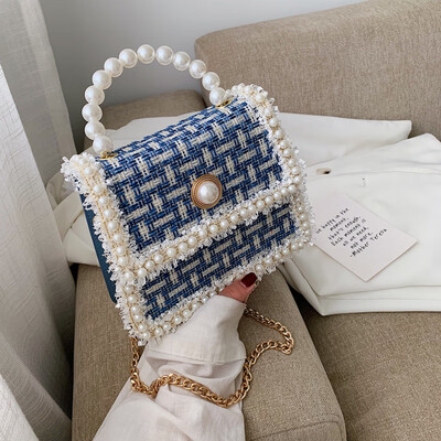 Ins Western Pearl Handheld Womens Bag 2019 New Bag Joker Wool Chain Bag Single Shoulder Messenger Bag
Ins Western Pearl Handheld Womens Bag 2019 New Bag Joker Wool Chain Bag Single Shoulder Messenger Bag