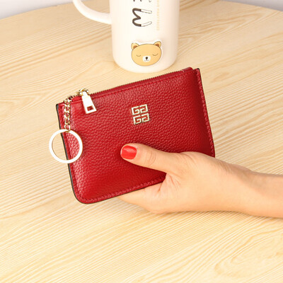 The first layer of cowhide Europe&the United States big ladies leather short paragraph purse zipper mini lychee with ring key bag
The first layer of cowhide Europe&the United States big ladies leather short paragraph purse zipper mini lychee with ring key bag