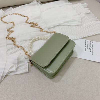 2019 new simple fashion temperament chain shoulder Messenger bag female casual wild pearl portable small square bag
2019 new simple fashion temperament chain shoulder Messenger bag female casual wild pearl portable small square bag