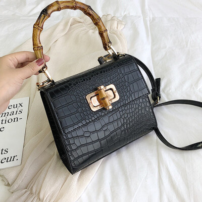 Qiao Bani 2019 new European&American style fashion solid color crocodile pattern bamboo bag hand bag shoulder diagonal cross trend handbags
Qiao Bani 2019 new European&American style fashion solid color crocodile pattern bamboo bag hand bag shoulder diagonal cross trend handbags