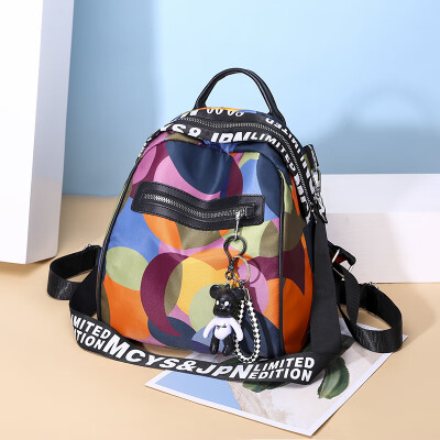 Colorful circle personality fashion backpack female tide Korean Joker Oxford canvas ladies small backpack
Colorful circle personality fashion backpack female tide Korean Joker Oxford canvas ladies small backpack