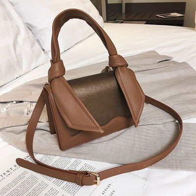 Qiao Bani 2019 new European&American style fashion magazine with the same paragraph color PU flip bag hand strap shoulder diagonal female bag
Qiao Bani 2019 new European&American style fashion magazine with the same paragraph color PU flip bag hand strap shoulder diagonal female bag