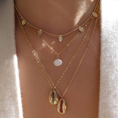 Bohemian Women Necklaces Heart Pearl Shell Pendant Clavicle Chain Multilayer Gold Necklace Set Glamour Female Beach Jewelry
Bohemian Women Necklaces Heart Pearl Shell Pendant Clavicle Chain Multilayer Gold Necklace Set Glamour Female Beach Jewelry