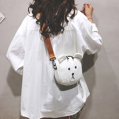 Mini bag female new 2019 Korean version of the wild girl canvas shoulder Messenger bag cartoon cute bear bag
Mini bag female new 2019 Korean version of the wild girl canvas shoulder Messenger bag cartoon cute bear bag
