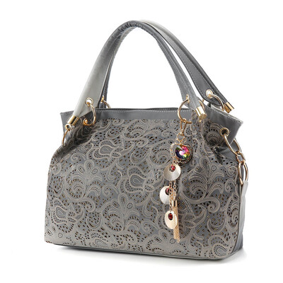 Tailored Fashion Ladies Leather Openwork Carved Wild Handbag Messenger Bag Shoulder Bag
Tailored Fashion Ladies Leather Openwork Carved Wild Handbag Messenger Bag Shoulder Bag