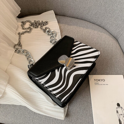 Textured womens bag Korean version of the popular zebra pattern chain bag female Messenger bag small female fashion sho
Textured womens bag Korean version of the popular zebra pattern chain bag female Messenger bag small female fashion sho