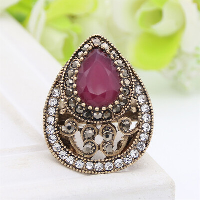 Vintage Turkish Hollow Flower Finger Rings Women Water Drop Resin Crystal Rings Antique Gold Color Jewelry Ethnic Wedding Ring
Vintage Turkish Hollow Flower Finger Rings Women Water Drop Resin Crystal Rings Antique Gold Color Jewelry Ethnic Wedding Ring