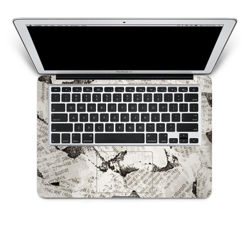 SkinAT 苹果笔记本MacBook手托保护贴膜 不含键盘 3M材料 凌乱的报纸 Pro 13