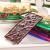 芭味富芭味富俄罗斯Russia国家馆黑巧克力榛子葡萄巧克力纯可可休闲零食 75%巧克力 袋装 90g 1盒