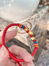 中國(guó)黃金（CHINA GOLD）黃金手鏈女足金招財(cái)貓轉(zhuǎn)運(yùn)珠福袋手飾七夕情人節(jié)禮物送女朋友老婆 【京速達(dá)】福袋貓手鏈 約1.3-1.35g 曬單實(shí)拍圖