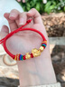 中國(guó)黃金（CHINA GOLD）黃金手鏈女足金招財(cái)貓轉(zhuǎn)運(yùn)珠福袋手飾七夕情人節(jié)禮物送女朋友老婆 【京速達(dá)】福袋貓手鏈 約1.3-1.35g 曬單實(shí)拍圖