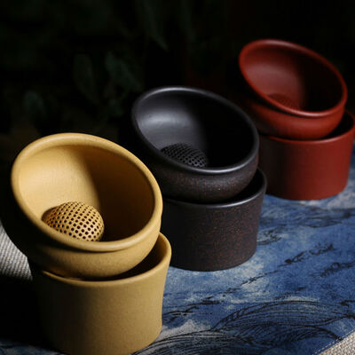 

Yixing Zisha Clay Yellow Chinese Gongfu Tea Strainer & Stand Set with Ball Filter