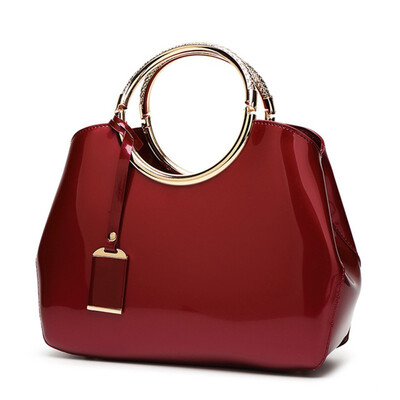 

New Pattern Fashion Womens Bag PU Patent Leather Ellipse Inclined shoulder bag Pure color Handbag soft surface Hard handle The si