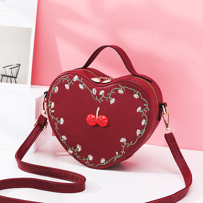 

Three-dimensional love bag female Korean fashion new womens bag shoulder diagonal handbag girl temperament peach small bag