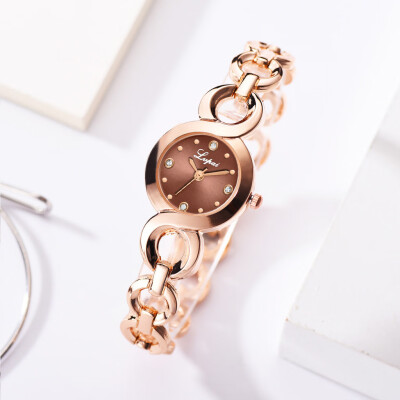 

RM Fashion Casual Four-Scale Diamond Dial Buckle Strap Ladies Quartz Watch