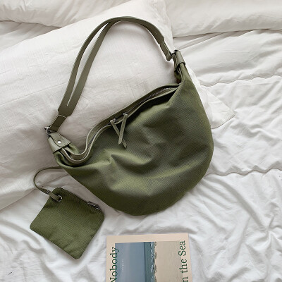 

Advanced sense of foreign style womens bag chic simple canvas bag new 2019 small fresh chest bag shoulder Messenger bag