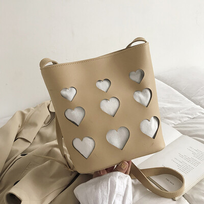 

2019 new casual temperament shoulder bag fashion little fairy hollow heart Messenger bag simple wild bucket bag