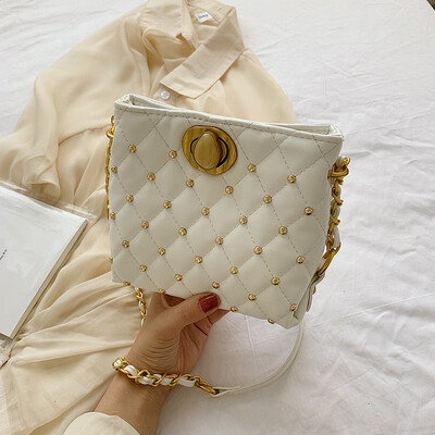 

Ins summer popular chain bag womens new 2019 Korean version of rivets fashion single shoulder oblique bag bucket bag