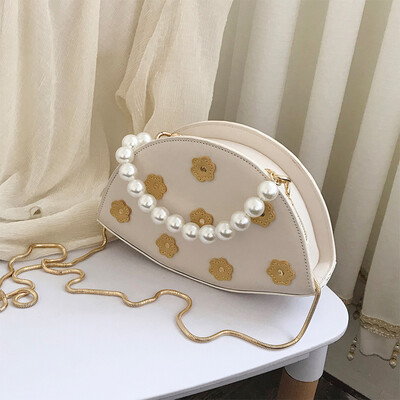 

Summer texture bag female 2019 new Korean version of the wild single shoulder slung fashion pearls portable chain dumplings package