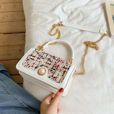 

Qiao Bani 2019 new South Korea Dongdaemun ins fashion contrast color flip bag hand strap shoulder diagonal tide handbag