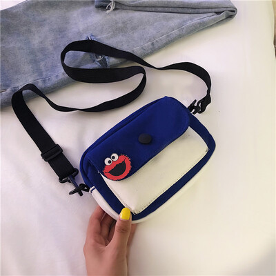 

2019 new cartoon cute canvas bag female fashion temperament contrast color Messenger bag chic casual wild shoulder bag
