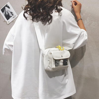 

Summer new small bag female 2019 new ins super fire canvas shoulder Messenger bag Korean version of the ocean cartoon package