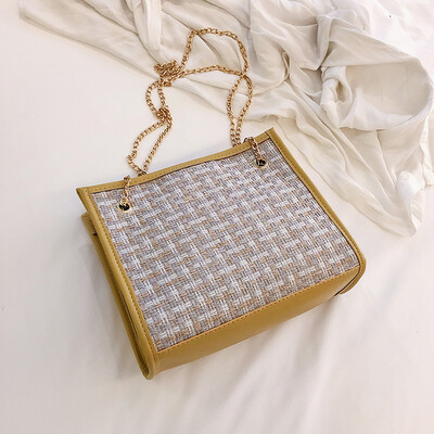 

2019 new simple contrast color woven bag fashion casual wild shoulder bag female Sen temperament chain Messenger bag