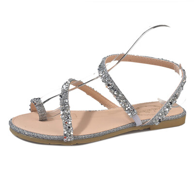 

Chic sandals female Xia Han version flat-bottomed Roman students wearing diamonds simple proto fairy shoes