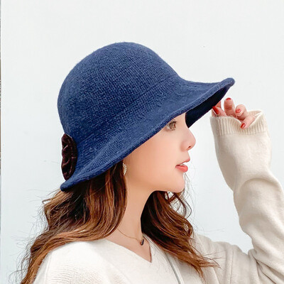 

Fall&Winter 2009 Fishermans Cap New Cute Butterfly Knot Korean Edition Ladys Pure-color Fresh Baitie Knitted Wool Cap