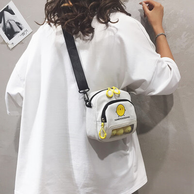 

Net red foreign small bag female 2019 new wave Korean version of the wild mini canvas bag wide shoulder strap shoulder Messenger bag