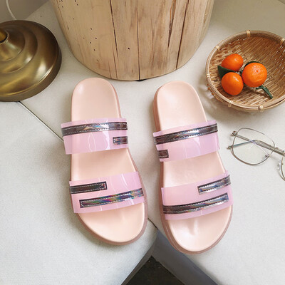 

Flat-soled transparent slippers in summer