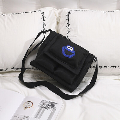 

Large capacity cloth bag female 2019 new wave Korean version of the cartoon student canvas shoulder bag cute Sesame Street Messenger bag