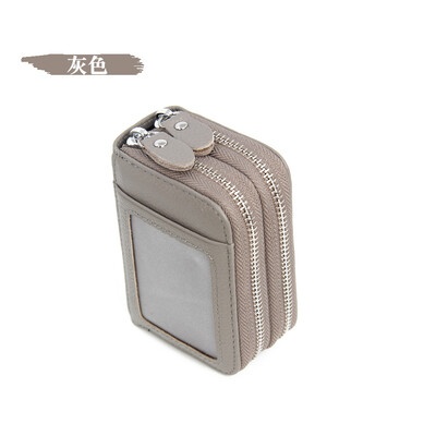 

The first layer of leather RFID plus anti-scanning leather organ card package double zipper purse with window anti-magnetic business card package