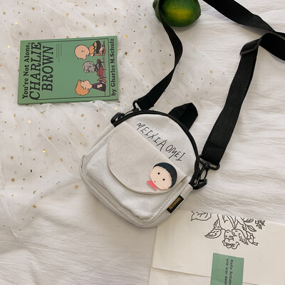 

2019 new casual simple versatile shoulder bag female cartoon cute canvas bag fashion personality letter Messenger bag