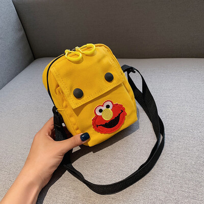 

Cute cartoon simple wild shoulder Messenger bag female 2019 new casual fashion ugly cute Sesame Street canvas bag
