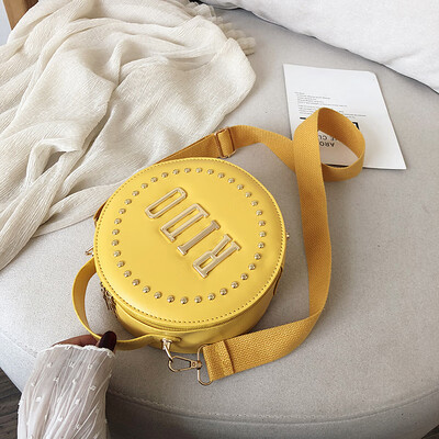 

2019 new fashion letter handbag personality rivet shoulder Messenger bag female casual simple wild small round bag