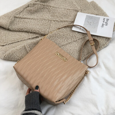 

Qiao Bani 2019 new European&American style fashion simple solid color embroidery line lock single shoulder diagonal trend handbags wholesale