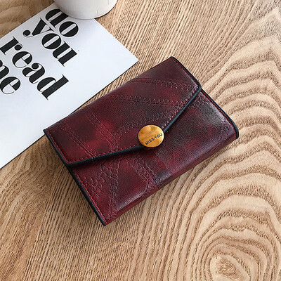 

2019 new wallets womens short Korean version of 100 super Huohuo back to ancient buckle wallet womens card bag zero wallet