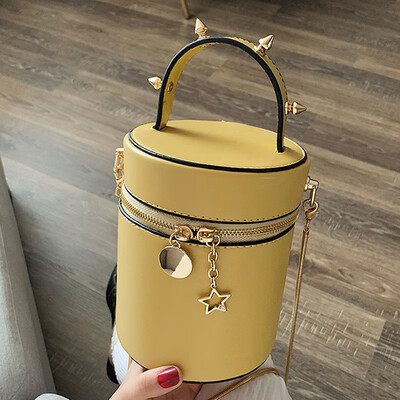

Bucket bag women 2019 spring&summer new trend rivets slung portable cylinder bag temperament chain bag