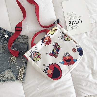 

2019 new casual fashion ugly sesame street portable canvas bag female cute cartoon wild shoulder Messenger bag