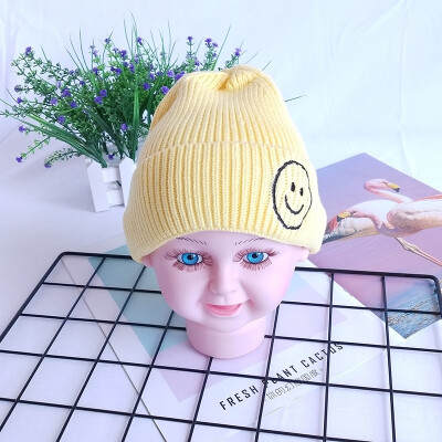 

Childrens wool hats Korea autumn&winter new warm smiling face knit cap head cap boys&girls baby hat candy