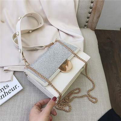 

Qiao Bani 2019 new Korean chic fashion studded flip bag shoulder slant diagonal trend handbags a generation