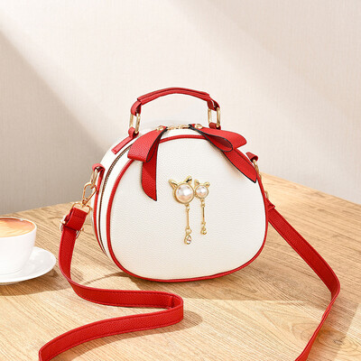 

Korean casual female bag hit color side small round bag cute cat shoulder diagonal package cherry girl handbag