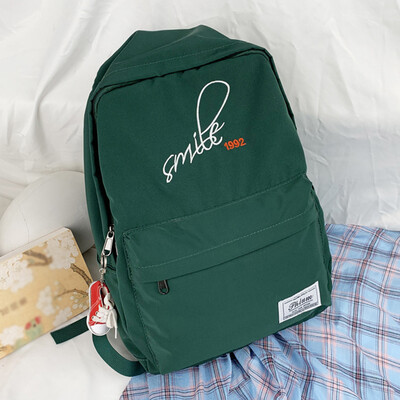 

New Men And Women Student Bag Korean Travel Backpack Wild Waterproof Backpack