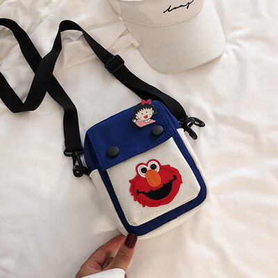 

Simple&versatile fashion contrast color shoulder Messenger bag female 2019 new casual cute cartoon sesame street canvas bag