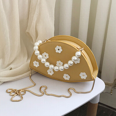

Summer texture bag female 2019 new Korean version of the wild single shoulder slung fashion pearls portable chain dumplings package