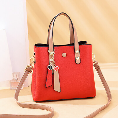 

Handbag lady simple large capacity collision color single shoulder huddle inclined pack foreign temperament Korean version tide